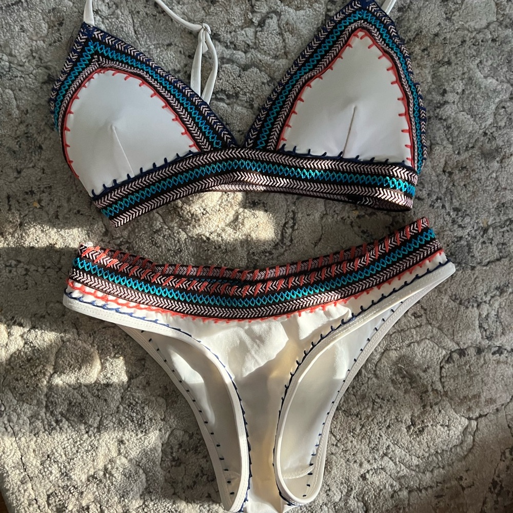 Adorable bikini set. Bought from pitaya , the brand is feather 11. worn once